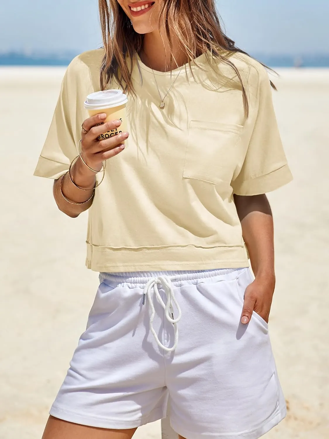 Fisoew Womens Oversized Crop Tops Workout Short Sleeve T Shirts Summer Casual Loose Fit Basic Tee Shirts with Pockets