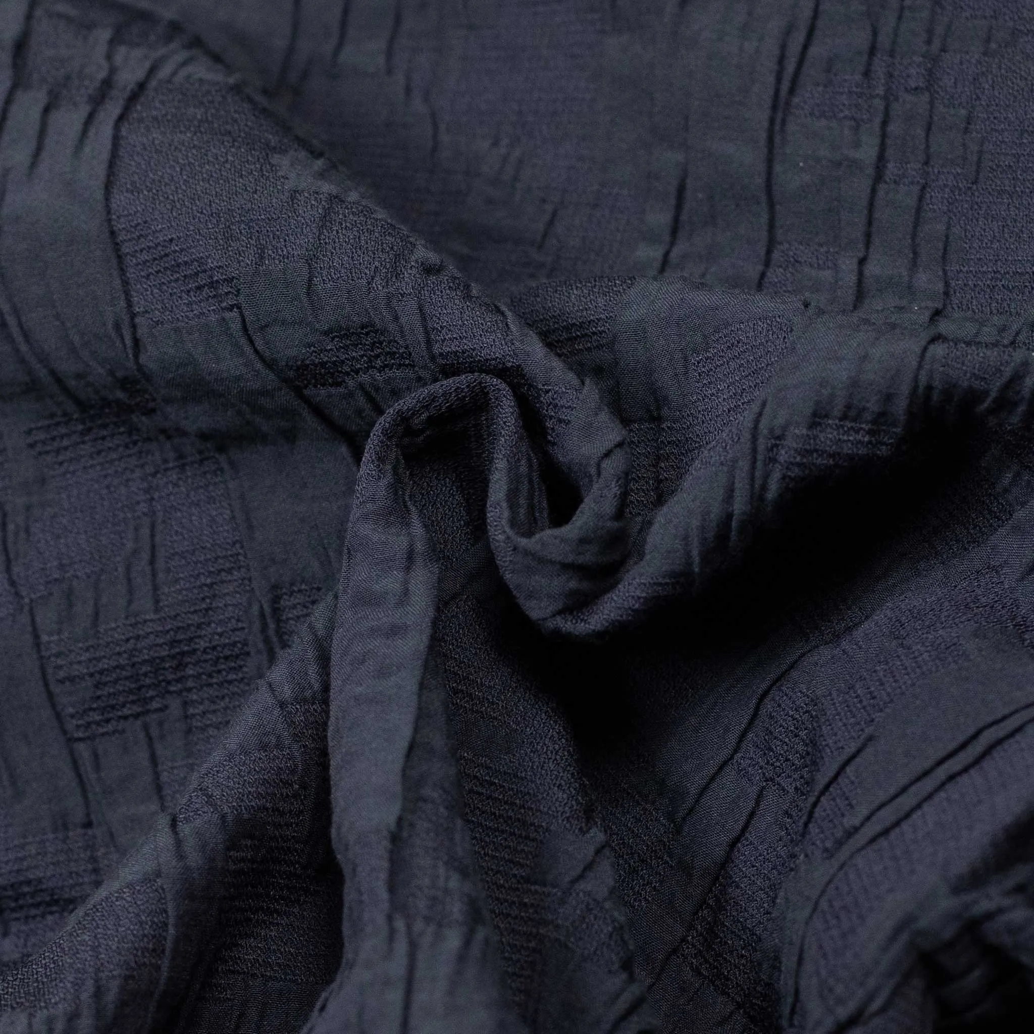 Single-pleat floating jacquard indigo cotton pants