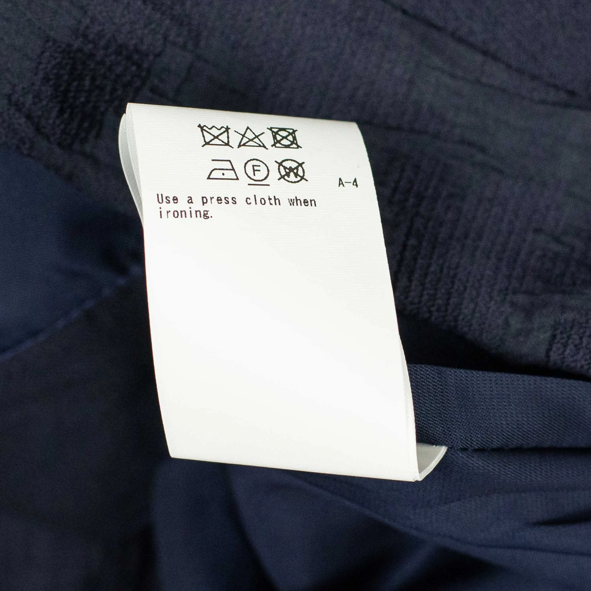Single-pleat floating jacquard indigo cotton pants